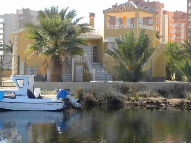 Casa en venta en Manga del Mar Menor La, Veneziola. Puro estilo de vida mediterráneo elegante villa con acceso al mar. Casas Manga del Mar Menor.