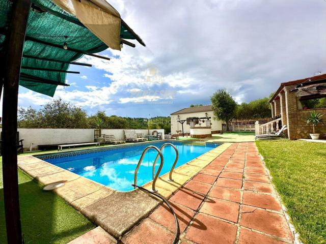 Casa en venta en Almodóvar del Río. ZONA CUEVAS BAJAS Parcela de terreno de 5.000m con casa de 110m, piscina, trastero. Casas Almodóvar del.