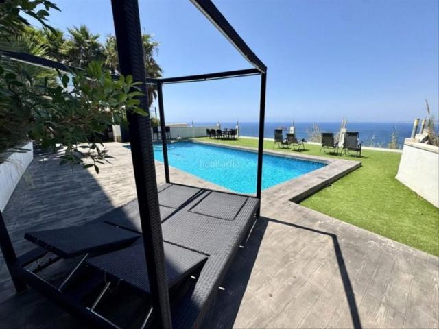 Casa en venta en Benidorm, Sierra Helada. Preciosa villa en El Rincón de Loix con vistas impresionantes a la bahía de Benidorm. Casas.