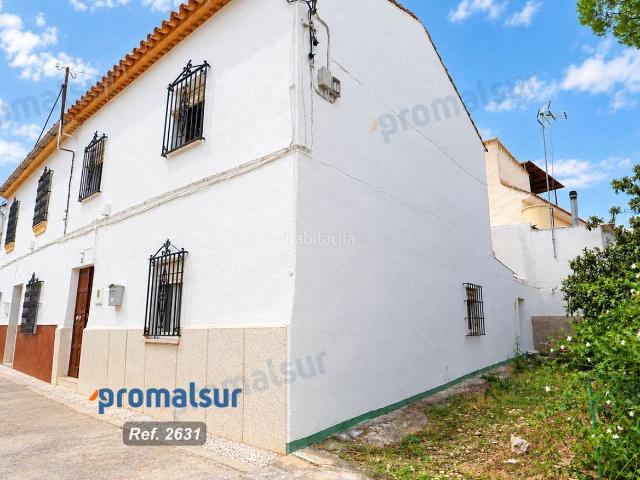 Casa en venta en Puente Genil. Casa en venta en El Palomar, 4 dormitorios. Casas Puente.