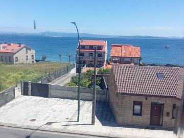 Casa en venta en Ribeira, Santa Uxía de Ribeira. Grande casa para vender. Casas.