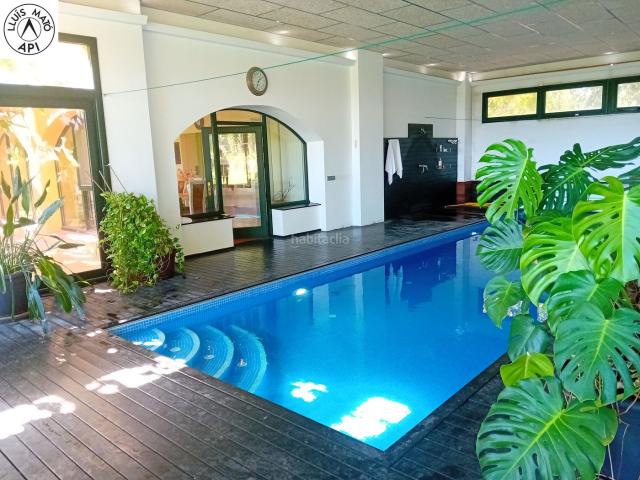 Casa en venta en Siurana. CASA DE POBLE AMB GRAN JARDÍ AMB PALMERES, PISCINA INTERIOR CLIMATITZADA, ASCENSOR I MOLT EFICIENT ENERGÈTICAMENT. Casas.
