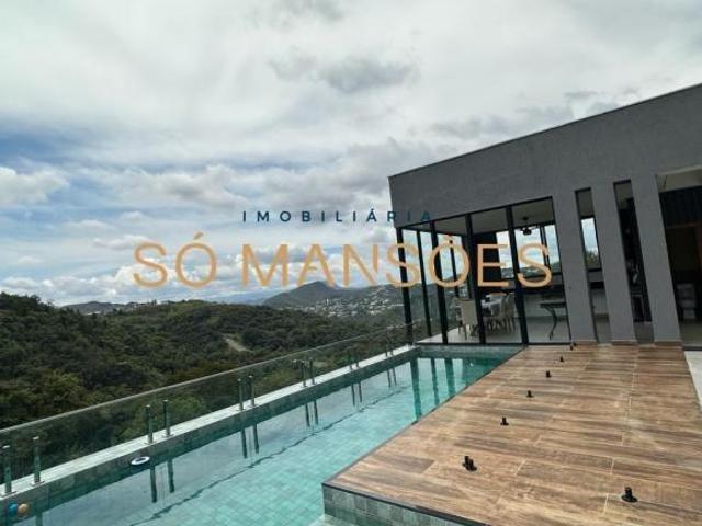 Casa Espaçosa de 333 m² à Venda com 4 Suítes e Vista Espetacular no Condomínio Vila Castela, Belo Ho