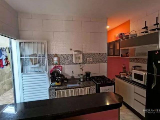 Casa geminada á venda na Mirim, em Praia Grande SP