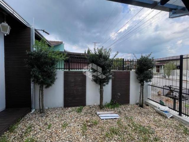 Casa geminada com 2 dormitórios, no loteamento Motocross, Arroio Grande