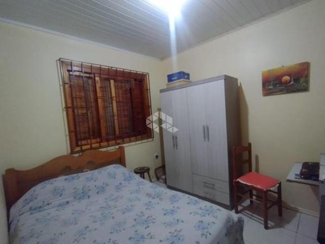 Casa geminada com 2 dormitórios e pátio em Santa Cruz do Sul