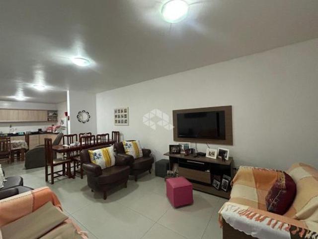 Casa geminada de 3 dormitórios no bairro Arroio Grande!