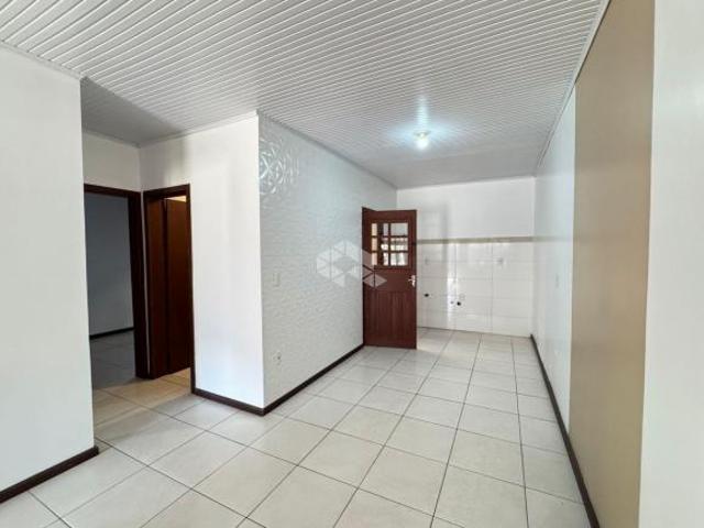 Casa geminada 02 dormitórios no Bairro Arroio Grande!