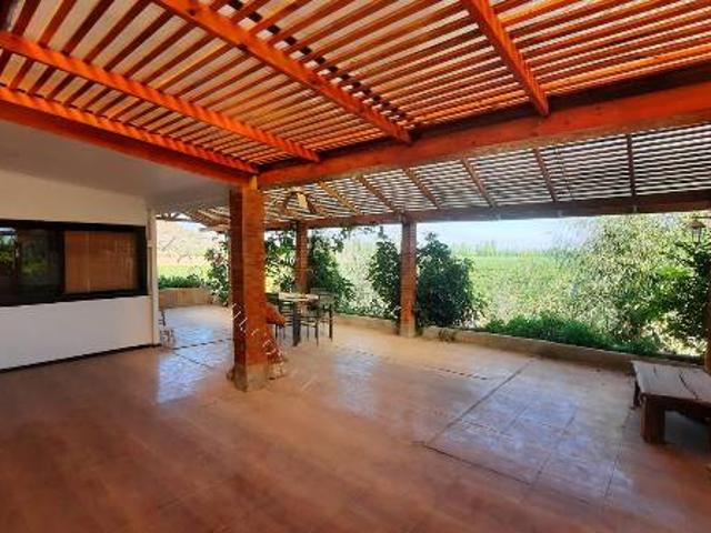 Casa grande parcelita quincho terraza frutales vista
