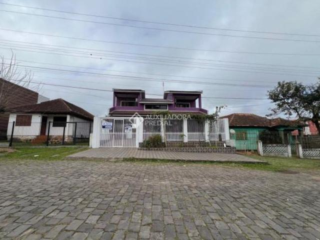 Casa Padrão com Piscina no centro de Charqueadas