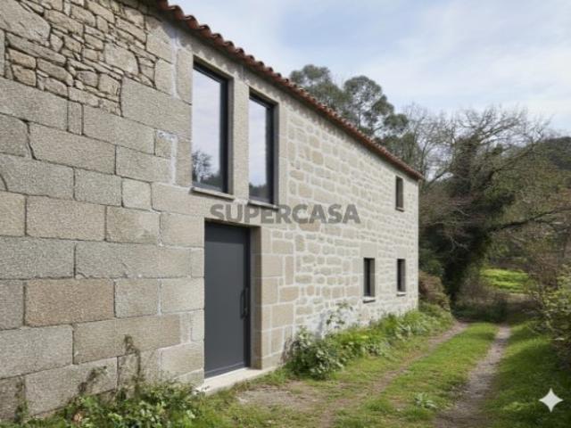 Casa para restauro em lote de 615 m2