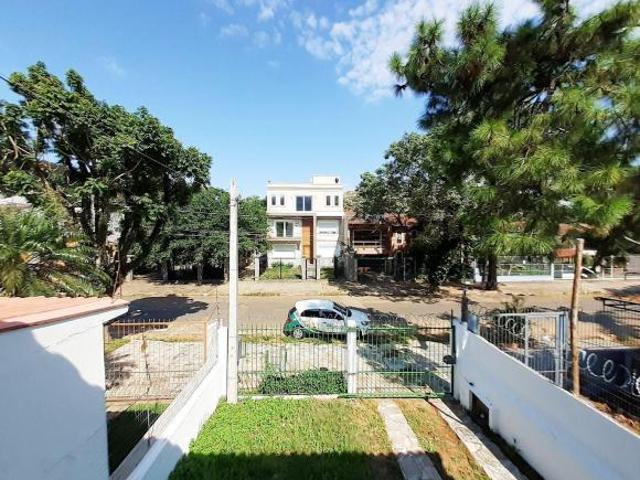 Casa para Venda 124m², 2 dormitórios com sacada e 2 vagas Glória