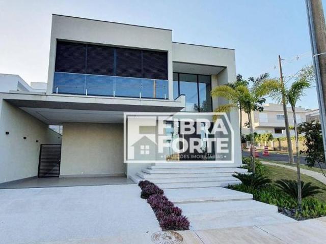 Casa para venda em condomínio de alto padrão na região do Alphaville com 3 suítes