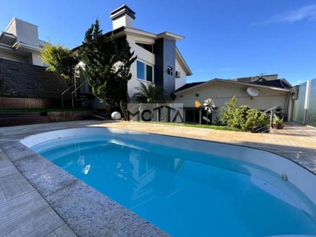 Casa para Venda em Erechim, JOSE BONIFACIO, 3 dormitórios, 2 suítes, 2 banheiros, 2 vagas