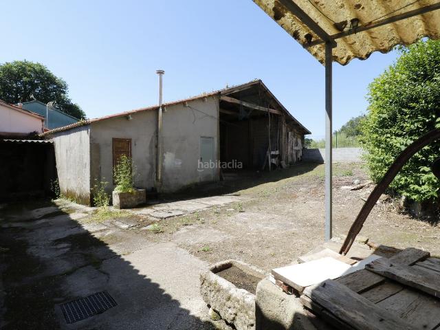 Casa pareada en venta en Curtis. Casa de planta baja con jardín en Teixeiro. Casas pareadas.