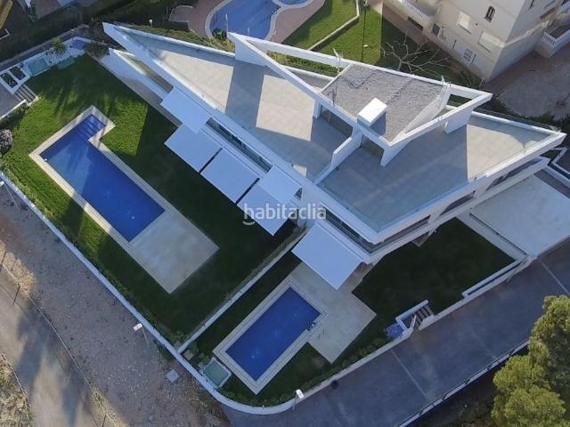 Casa pareada en venta en Alcossebre. Chalet en la playa del cargador. Casas pareadas.
