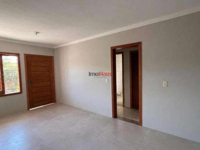 Casa pronta para morar com varanda e jardim no bairro Rothmann