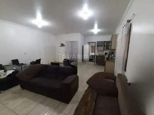 Casa Residencial com 1 dormitório e 1 vaga de garagem, no bairro Floresta