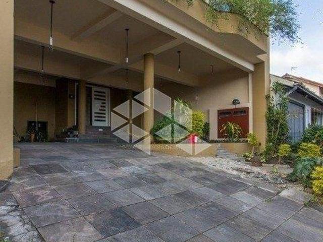 CASA COM 8 DORM NO BAIRRO JARDIM ITU EM PORTO ALEGRE