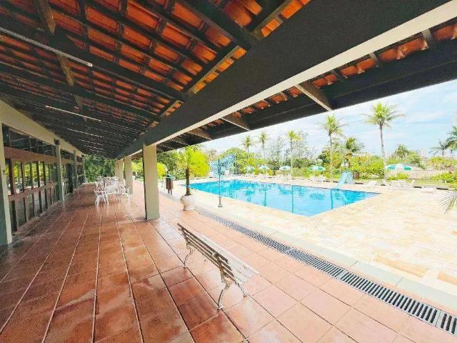 Casa / Sobrado em Condomínio para Locação em Guarujá/SP Jardim Três Marias 4 Quartos