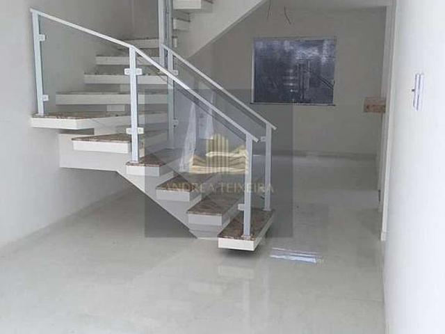 Casa / Sobrado em Condomínio para Locação em Lauro de Freitas/BA Buraquinho 4 Quartos