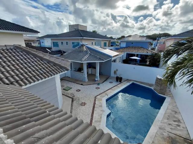 Casa / Sobrado em Condomínio para Locação em Lauro de Freitas/BA Buraquinho 4 Quartos