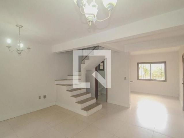 Casa / Sobrado em Condomínio para Locação em Porto Alegre/RS Vila Nova 3 Quartos