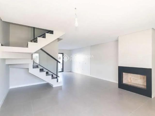 Casa / Sobrado em Condomínio para Locação em Porto Alegre/RS Campo Novo 3 Quartos