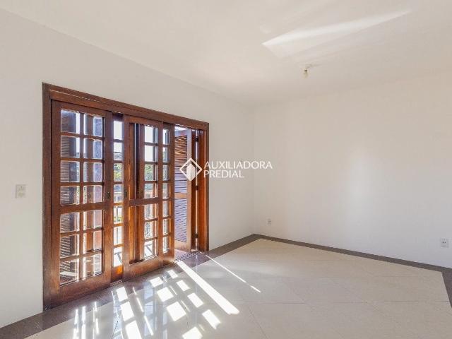 Casa / Sobrado em Condomínio para Locação em Porto Alegre/RS Parque Santa Fé 4 Quartos