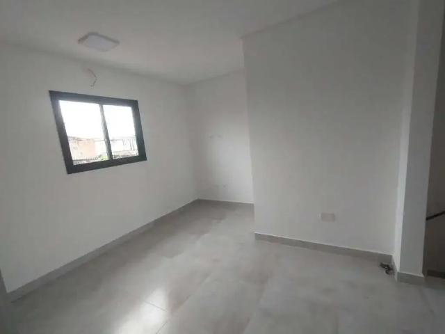 Casa / Sobrado em Condomínio para Locação em Praia Grande/SP Vila Antártica 2 Quartos