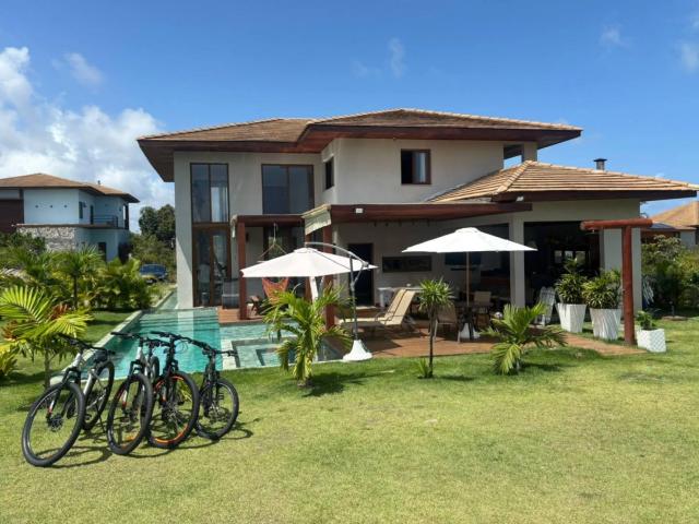 Casa / Sobrado em Condomínio para Venda em Mata de São João/BA Praia do Forte 5 Quartos