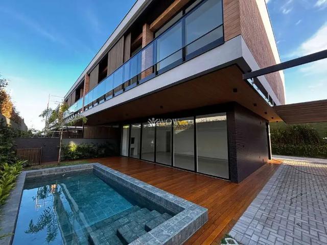 Casa / Sobrado em Condomínio para Venda em Balneário Camboriú/SC Praia do Estaleiro 4 Quartos