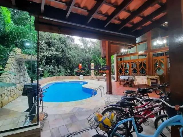 Casa / Sobrado em Condomínio para Venda em Bertioga/SP Guaratuba 4 Quartos