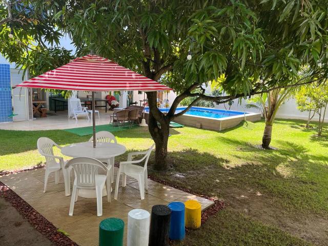 Casa / Sobrado em Condomínio para Venda em Camaçari/BA Abrantes 4 Quartos