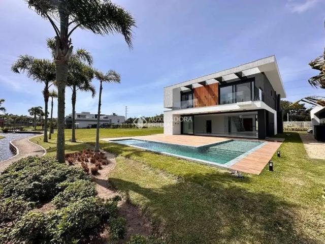Casa / Sobrado em Condomínio para Venda em Capão da Canoa/RS Capão Ilhas Resort 5 Quartos