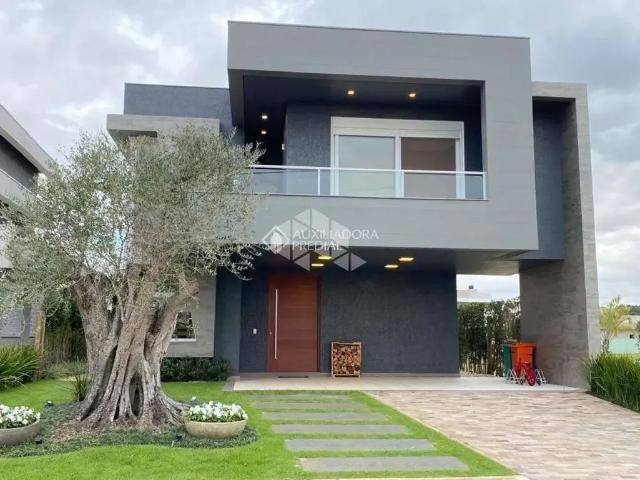 Casa / Sobrado em Condomínio para Venda em Capão da Canoa/RS Capão Ilhas Resort 5 Quartos