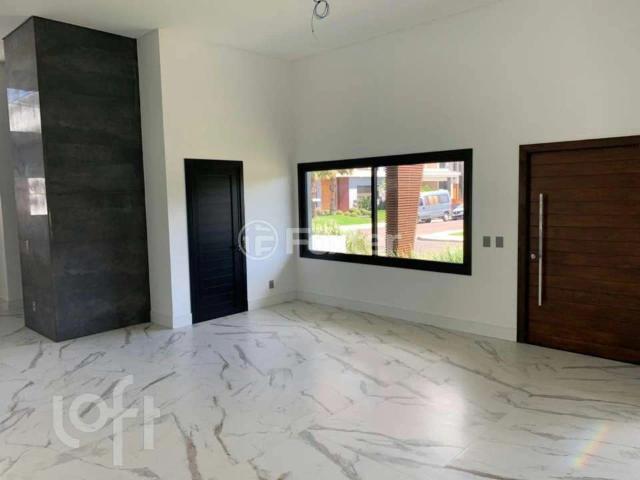Casa / Sobrado em Condomínio para Venda em Capão da Canoa/RS Centro 3 Quartos