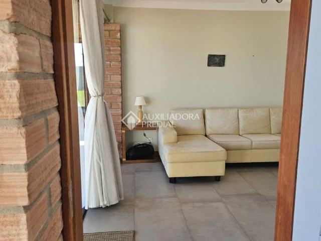 Casa / Sobrado em Condomínio para Venda em Capão da Canoa/RS Curumim 4 Quartos