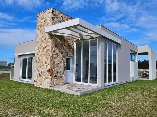Casa / Sobrado em Condomínio para Venda em Capão da Canoa/RS Arroio Teixeira 4 Quartos