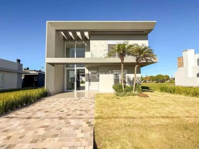 Casa / Sobrado em Condomínio para Venda em Capão da Canoa/RS Arroio Teixeira 4 Quartos