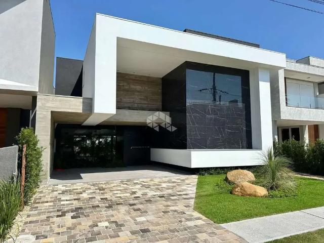 Casa / Sobrado em Condomínio para Venda em Capão da Canoa/RS Capão Ilhas Resort 5 Quartos