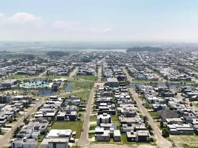 Casa / Sobrado em Condomínio para Venda em Capão da Canoa/RS Purumim 4 Quartos