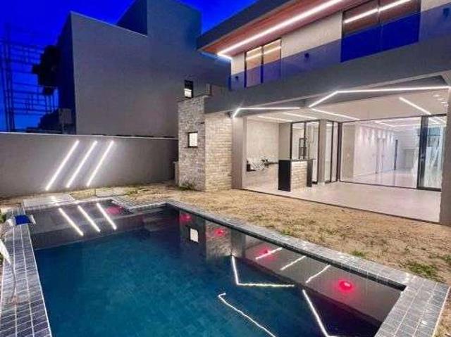 Casa / Sobrado em Condomínio para Venda em Eusébio/CE Cidade Alpha 4 Quartos