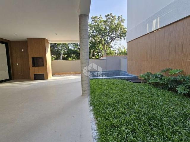 Casa / Sobrado em Condomínio para Venda em Florianópolis/SC Cacupé 3 Quartos