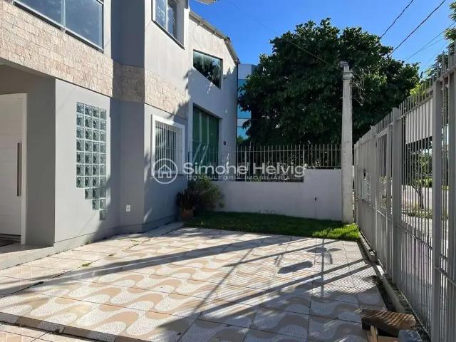 Casa / Sobrado em Condomínio para Venda em Guaíba/RS Parque 35 4 Quartos