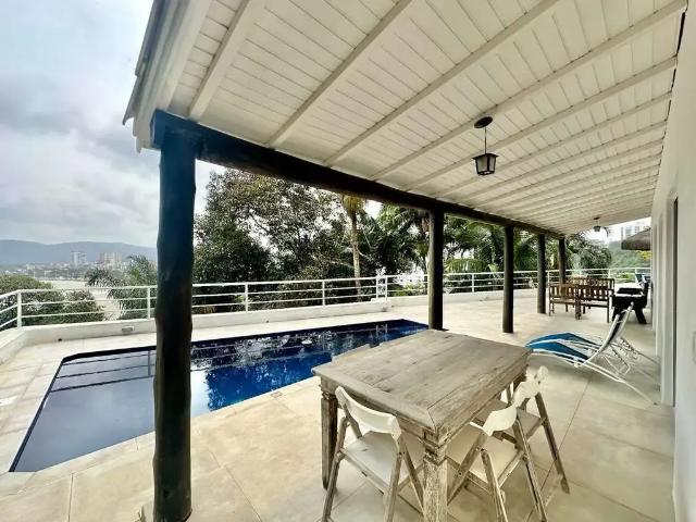 Casa / Sobrado em Condomínio para Venda em Guarujá/SP Península 4 Quartos
