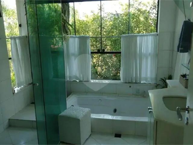 Casa / Sobrado em Condomínio para Venda em Itapecerica da Serra/SP Chácara da Lagoa 4 Quartos