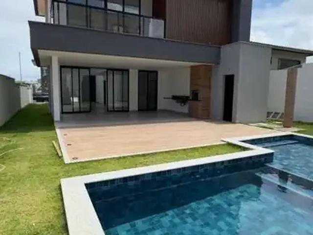 Casa / Sobrado em Condomínio para Venda em Lauro de Freitas/BA Buraquinho 4 Quartos