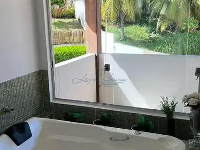 Casa / Sobrado em Condomínio para Venda em Lauro de Freitas/BA Buraquinho 4 Quartos