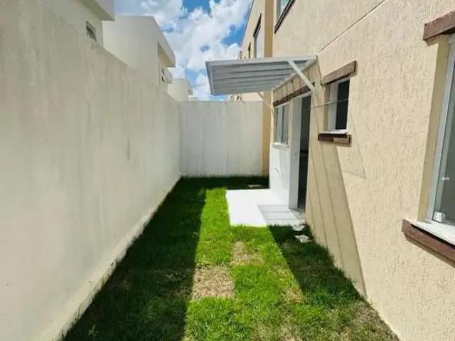 Casa / Sobrado em Condomínio para Venda em Lauro de Freitas/BA Buraquinho 4 Quartos